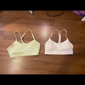 White and green flowy y sports bras. Both size 4.